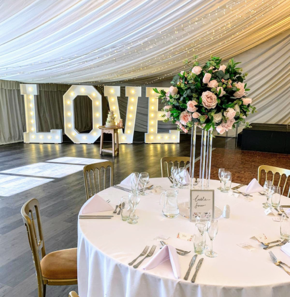 love sign next to table at Netley Hall